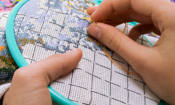 depositphotos_4780091-stock-photo-embroidery-in-the-childrens-hands